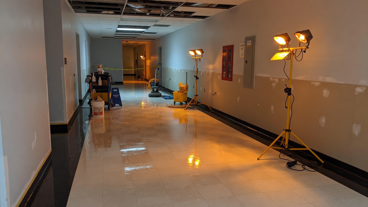 High-gloss VCT corridor after strip and wax in Charlotte